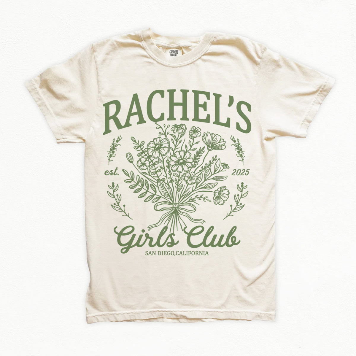 White bachelorette t-shirt with green floral design and text on a white background