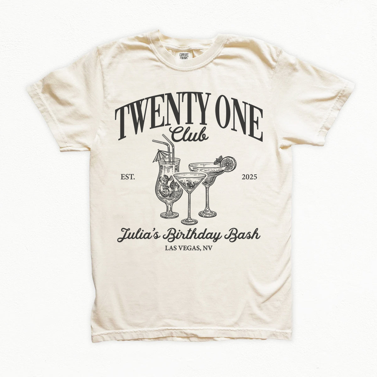 Beige bachelorette t-shirt with 'Twenty One Club' design featuring cocktails and text on a white background