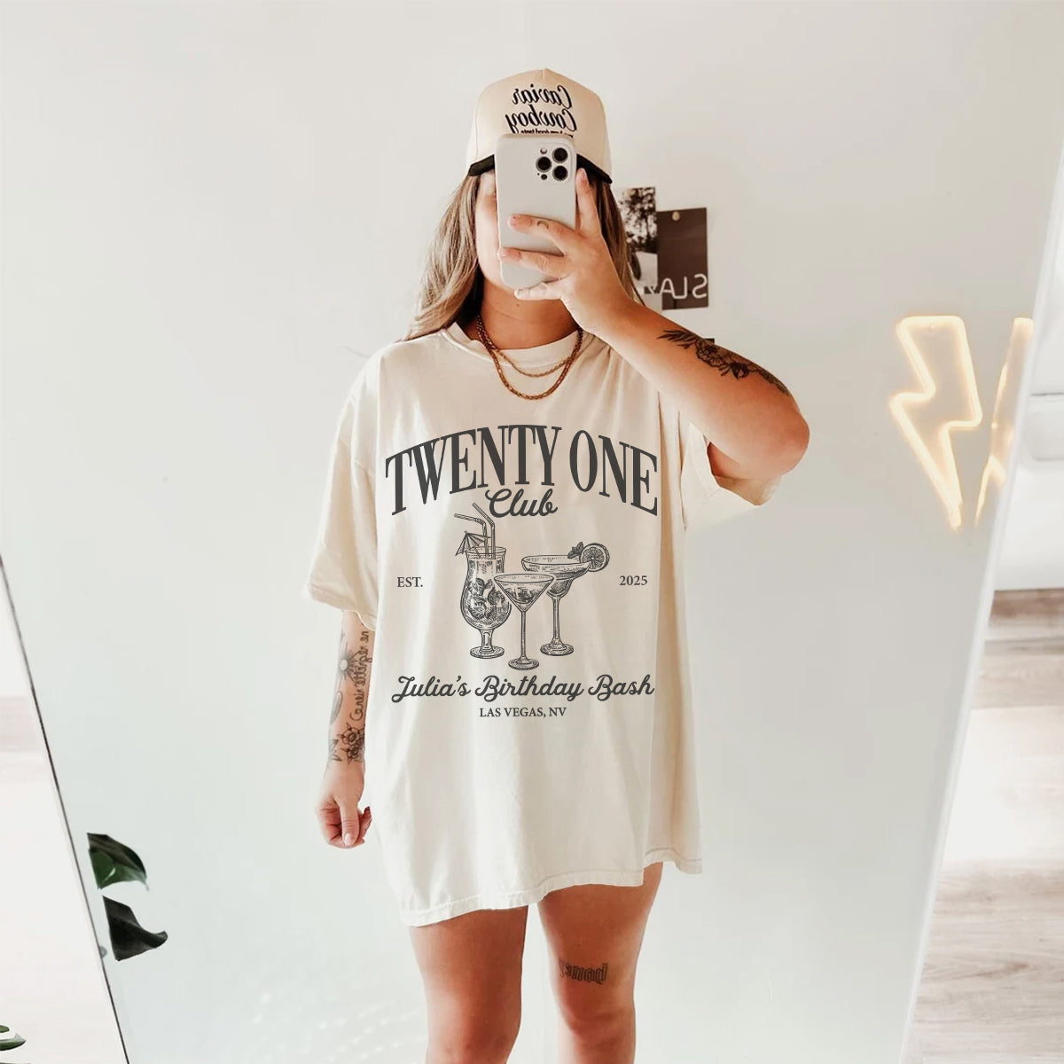 Person wearing a 'Twenty One Club' bachelorette t-shirt in a casual setting.