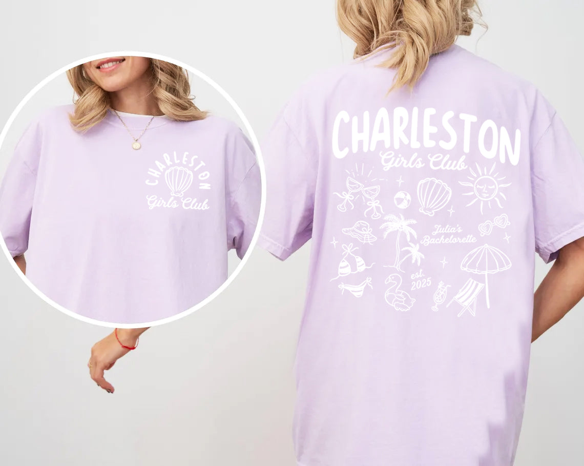 Lavender bachelorette t-shirt with 'Charleston Girls Club' text and graphics on a plain background