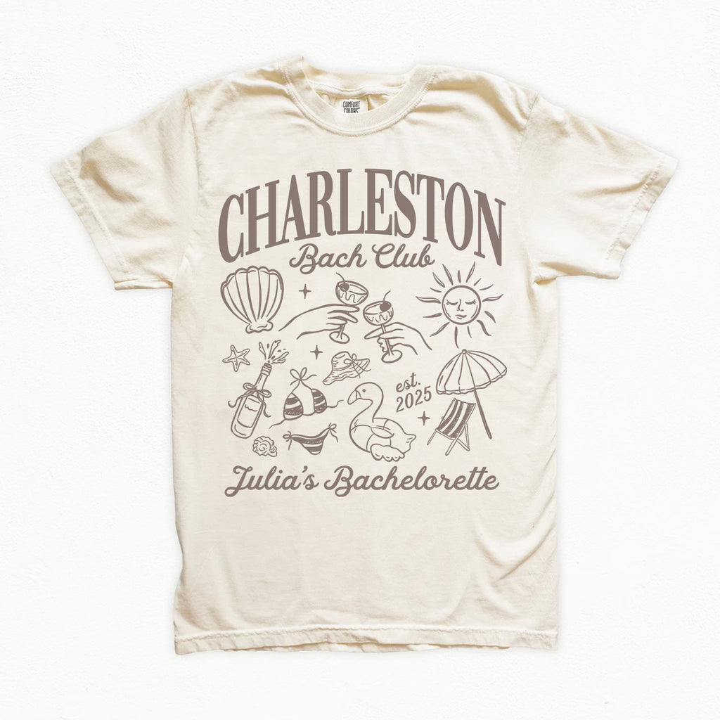 Beige bachelorette t-shirt with 'Charleston Bach Club' design on a white background