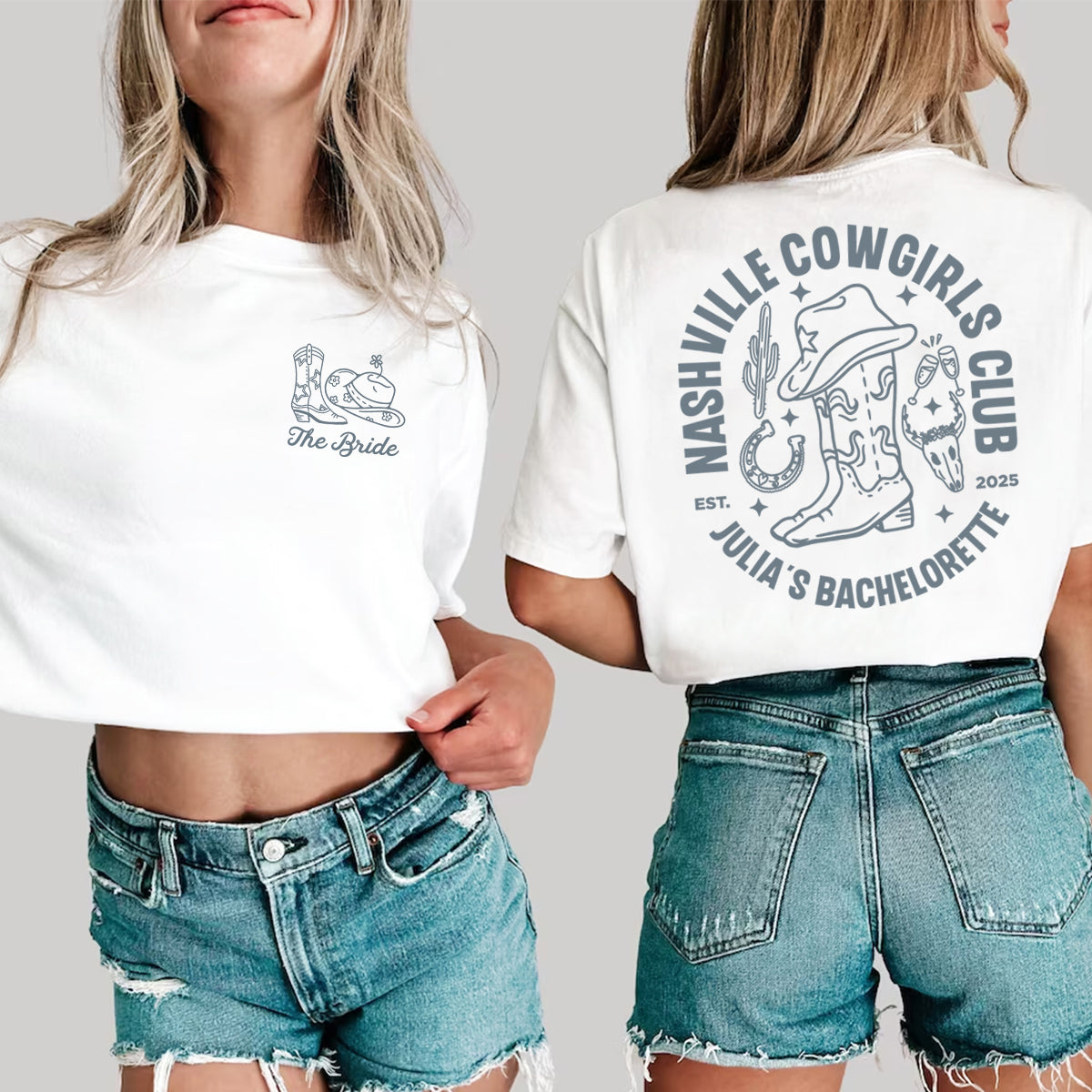 Two people wearing white bachelorette t-shirts with cowboy-themed designs and denim shorts on a plain background.