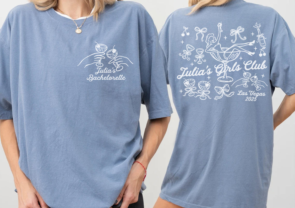 Two blue bachelorette t-shirts with white graphics and text, one on the front and one on the back, worn by a person.