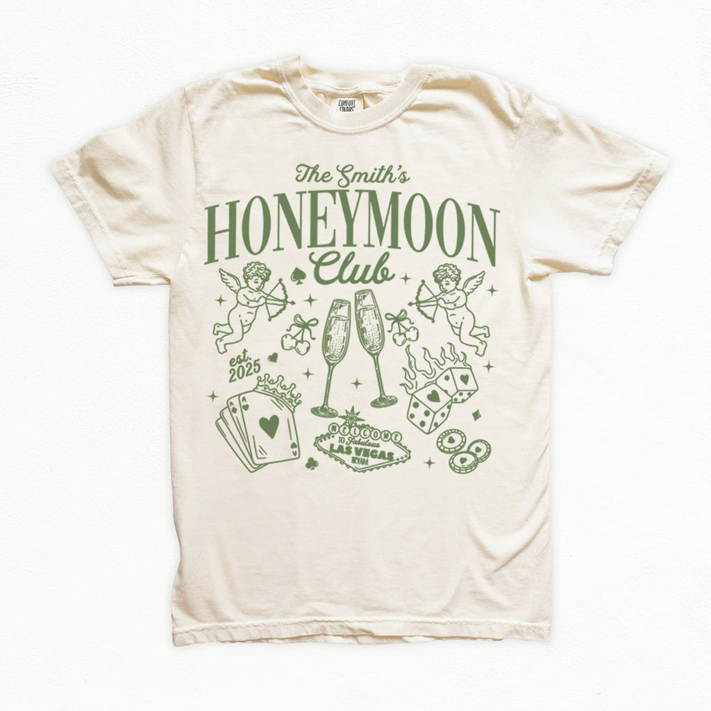 Beige bachelorette t-shirt with green 'Honeymoon Club' design on a white background