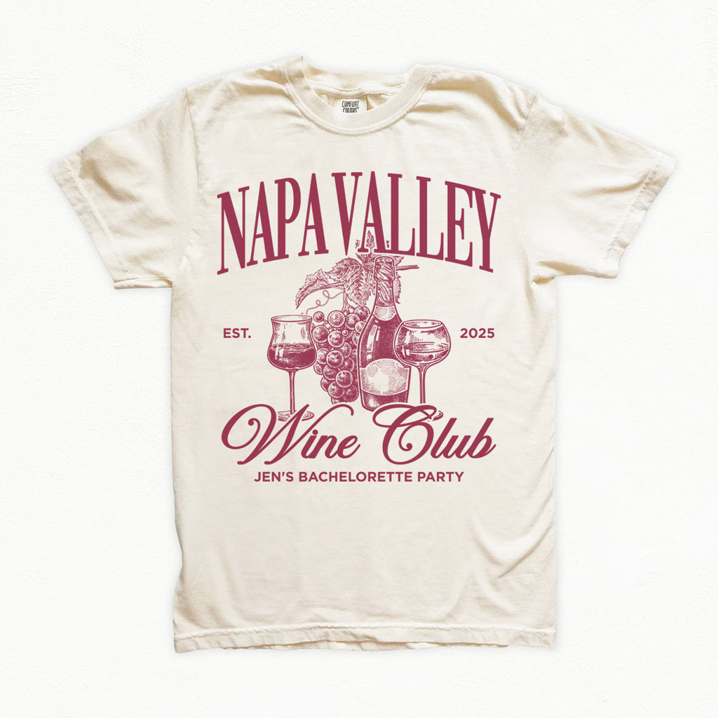 Beige t-shirt with 'Napa Valley Wine Club' bachelorette design in red on a white background