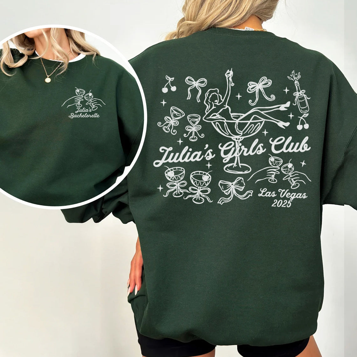 Green sweatshirt with 'Julia's Girls Club Las Vegas 2025' design on a plain background