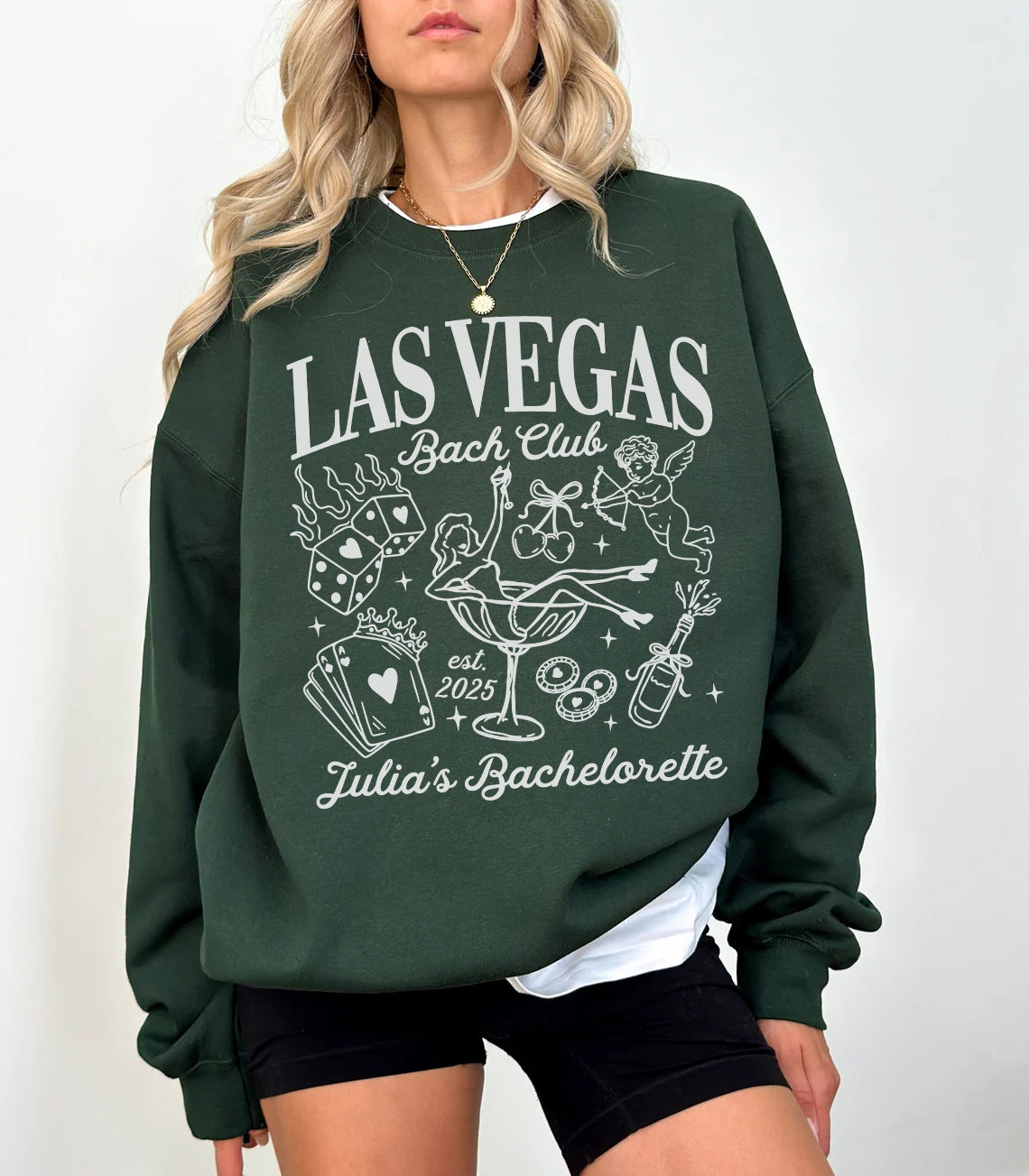 Green sweatshirt with 'Las Vegas Bach Club' design worn by a person on a white background